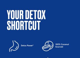 Fitness focused person holding their stomach after a heavy meal, representing gas and bloating relief goals