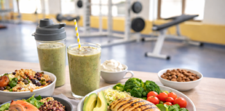 Healthy post workout meal with grilled chicken quinoa avocado vegetables and protein smoothie in a gym setting